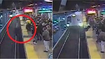 Watch terrifying video: Man falls on tracks in front of train, worker saves him
