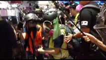 Hong Kong police shove to floor and pepper spray journalists