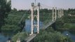 نظام أسد يدمر الجسر المعلق بدير الزور لينشئ جسراً روسياً - هنا سوريا