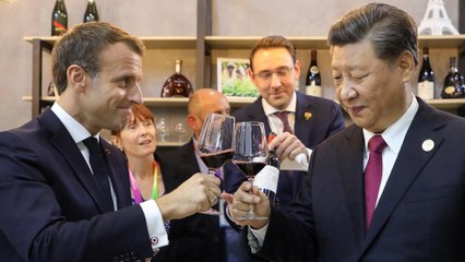 Xi and Macron sip wine together in Shanghai trade fair