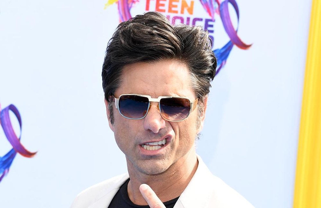 John Stamos' adorable distraction