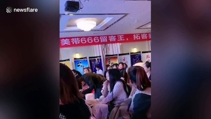 Cosmetic company CEO washes the feet of top-performing salesperson in China