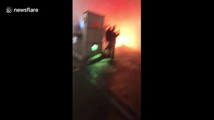 Wild scene as Ajax fans set off flares outside London hotel ahead of wild Champions League clash with Chelsea