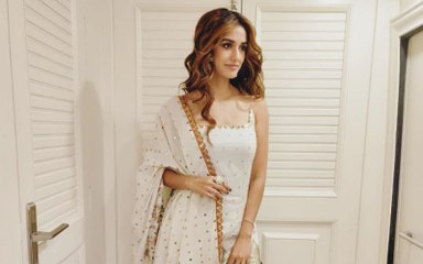 Radhe Muharat Puja: Disha Patani looks divine in white and gold, our eyes are on the box of kaju katli though