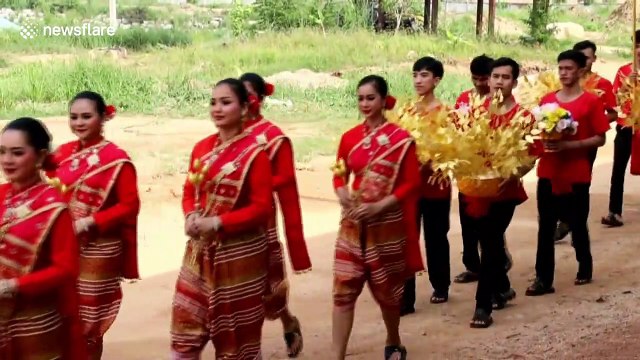 Baby elephant born at zoo in Thailand and blessed by Buddhist monks