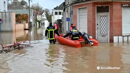 Town floods after rain causes river to flow over its banks