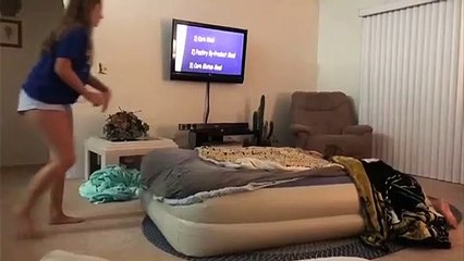 Girl Flies Off Of An Air Mattress When Her Older Sibling Jumps On It