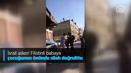 İsrail askeri Filistinli babaya çocuğunun önünde silah doğrulttu