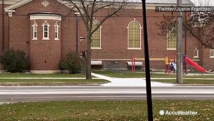 Streets slightly coated after light snowfall