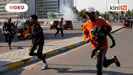 Iraqi security forces break up protests in Battle of the Bridges