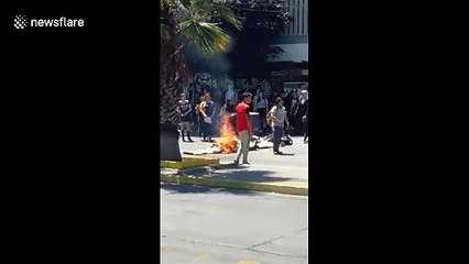 Chilean students vandalizing the streets of Santiago