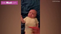 Baby has hilariously blissed out reaction to calming head scratcher