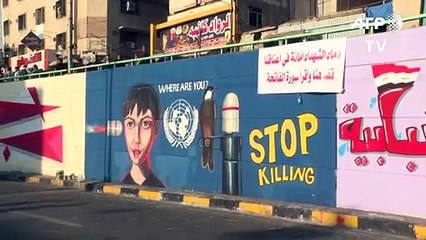 الألوان لغة "الثورة" على جدران بغداد