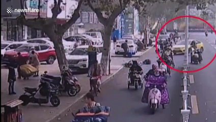 Chinese driver thrown out of car after pressing accelerator by mistake