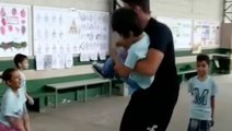 Teacher Brightens Student's Day By Helping Him Jump Rope
