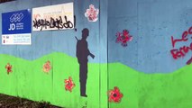 Remembrance mural daubed with graffiti