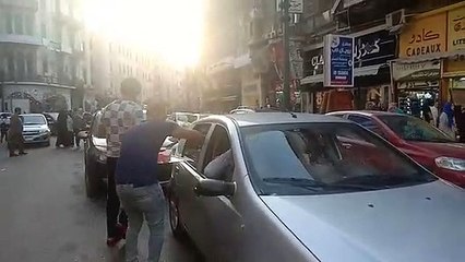 الإسكندرانية يوزعون الشربات على السيارات احتفالا بالمولد النبوى