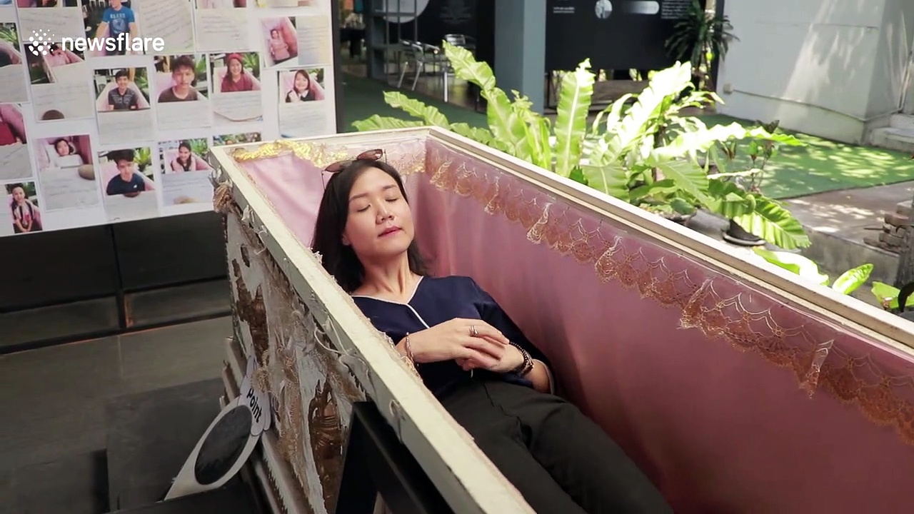 Cafe au lay: Customers LIE IN COFFINS at Thai “death cafe”