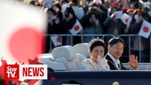 Japan imperial couple rides through Tokyo in grand enthronement parade