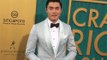 Henry Golding wants Idris Elba to play James Bond