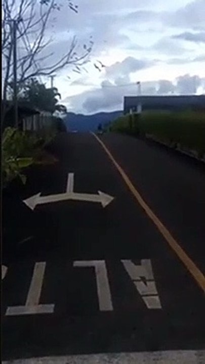 Kid On A Toy Car Rides Down A Hill And Fails