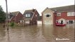 Disastrous flooding forces residents to leave their homes