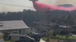 Les images impressionnantes d'un avion super tanker qui largue du retardant sur les incendies en Australie