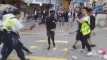 Al menos dos manifestantes heridos por disparos de la Policía en Hong Kong (C)
