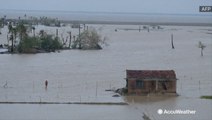 Homes surrounded by floodwaters after cyclone ravishes island