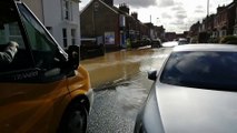 Watch torrent of water submerge Horsham town centre road