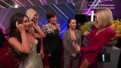 Awkward! Kim cuts off Kourtney on People's Choice red carpet