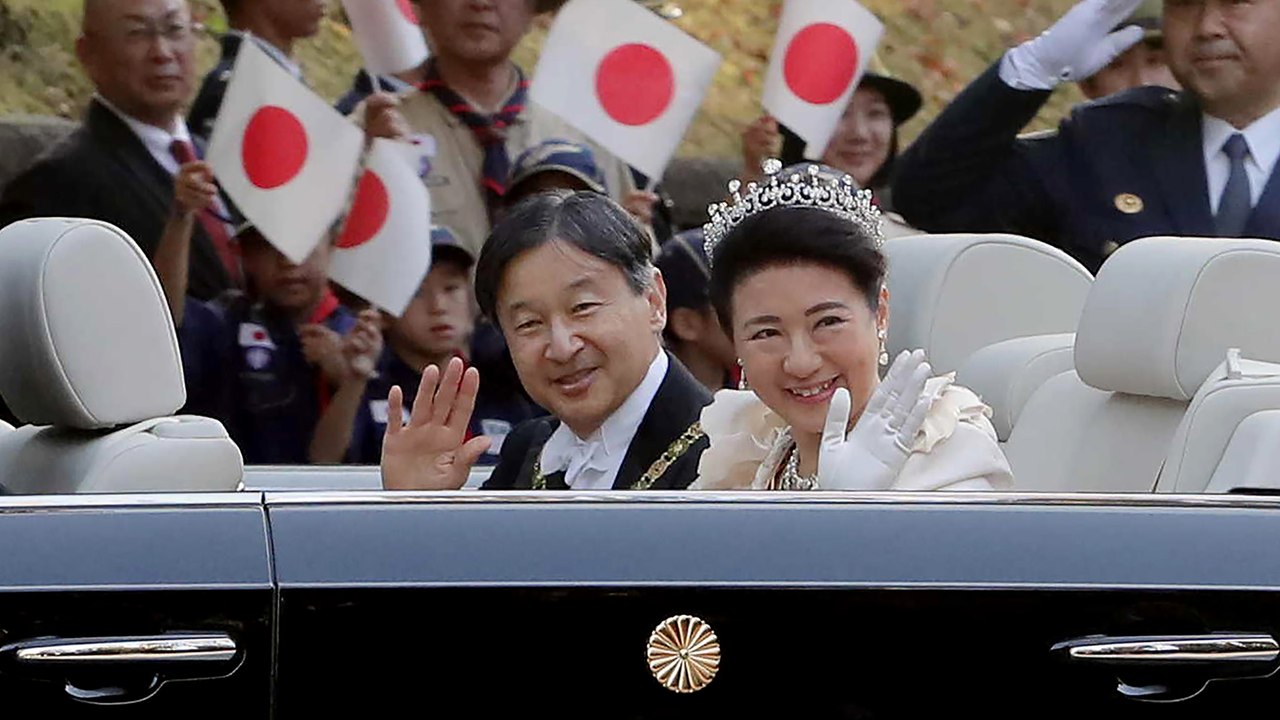 Japan's new emperor Naruhito greeted by cheering crowds at rare imperial parade