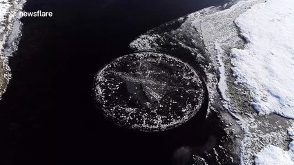 Incredible drone footage captures mysterious spinning ice circle in northern China