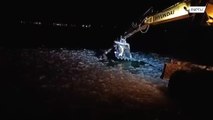 PAWsitive news! Dog gets pulled out of icy lake in excavator bucket
