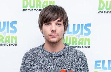 Louis Tomlinson brands One Direction's hits 'vague'