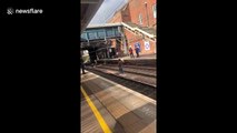 Heart-stopping moment man on track jumps to safety at last second at station in Essex, UK