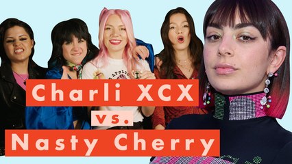 Charli XCX Battles Her Band Mates in a Tense Round of Thumb Wars