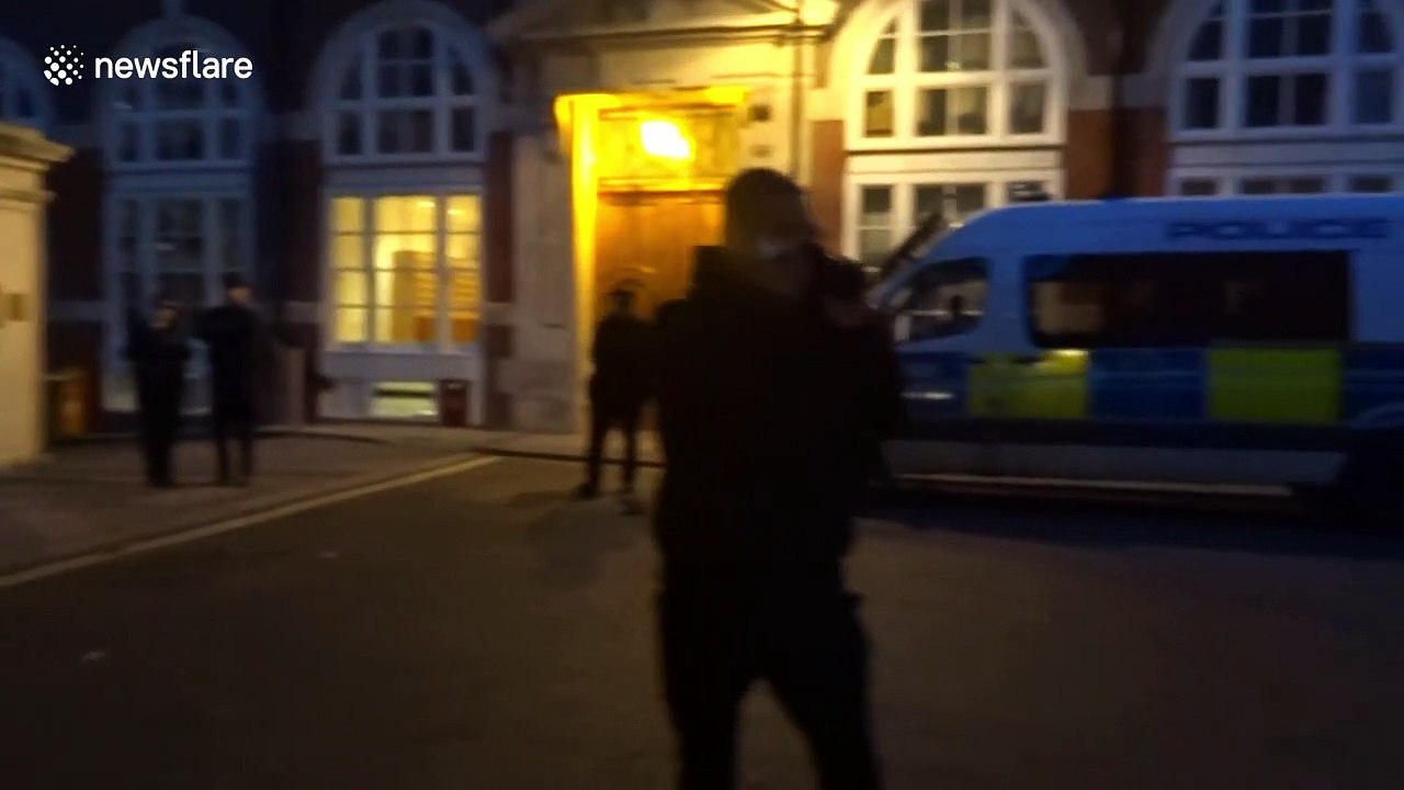 Climate protesters rally outside the Conservative Campaign HQ in London