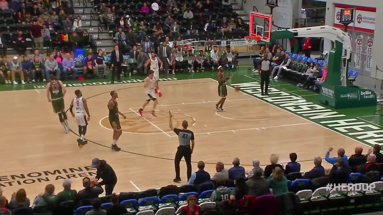 Phil Booth knocks it down as the clock expires