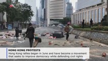 Hong Kong wakes up to 4th consecutive day of tear gas, road blocks