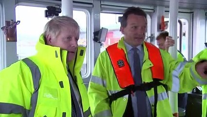 Boris Johnson drives dredger on Bristol port visit