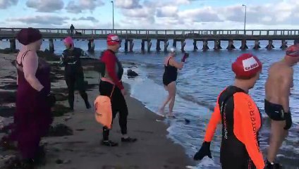 Sea swimmers brave bitter North Sea for the sixth Winter Coat Amnesty for Crisis in Amble.