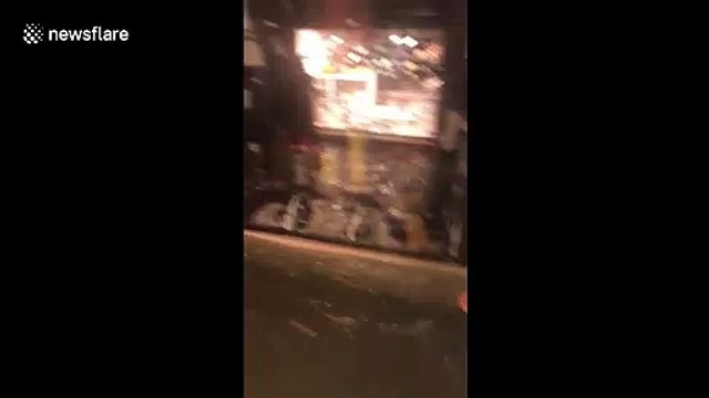 UK tourists wade through deep flood water as Venice is partially submerged