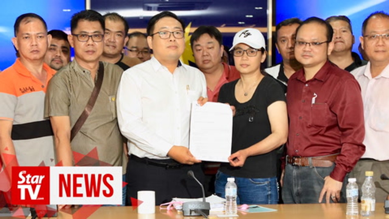 E-hailing drivers sue Grab, Transport Ministry over workers' rights