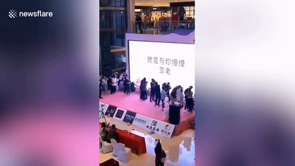 Man invades stage and attacks best friend's wife for participating in kissing competition with another man