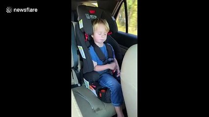 Impressive little boy in Georgia accurately sings a country song half asleep