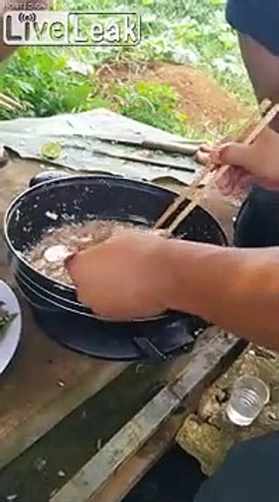 People eating alive fish
