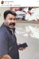 mohanlal's latest photo with mamangam poster Has Gone Viral | FilmiBeat Malayalam