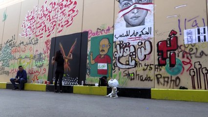 رسوم غرافيتي "الثورة" تجتاج أحياء وسط بيروت الفاخرة