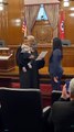 Judge Swear In A New Lawyer While Bouncing Her Baby On His Hip